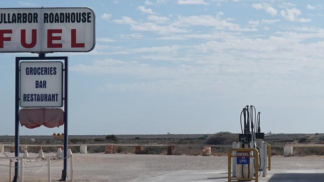 picture shows a part of a roadhouse at the Nullarbor Plain, fuel station and sign