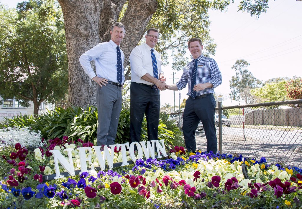 Admiring the floral display at Newtown State School are (from left) Shadow Minister for Education and Training Tim Mander MP, Member for Toowoomba North Trevor Watts MP and Newtown State School Principal Ben Kidd. . Picture: Photo Contributed