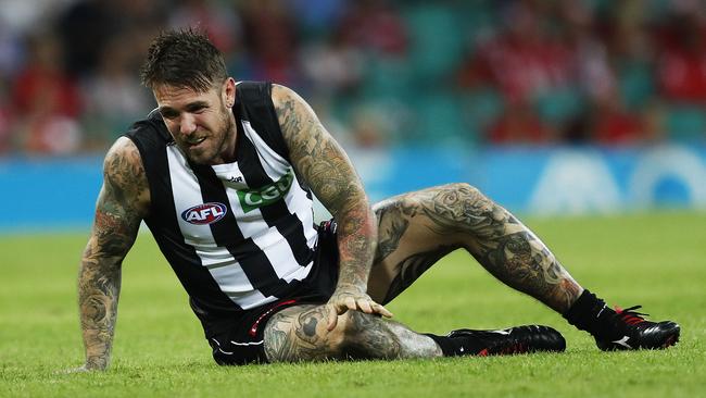 Dane Swan goes down in the opening round. Picture: Phil Hillyard