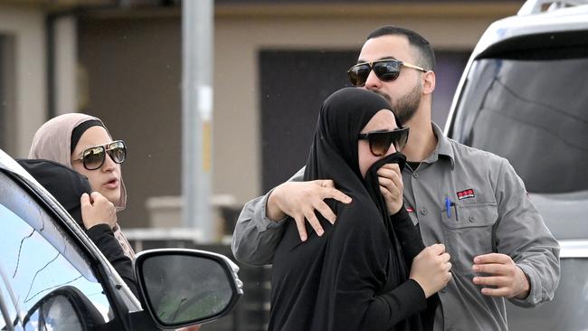 Distressed family and friends at the scene of the shooting deaths. Picture: NCA NewsWire / Jeremy Piper