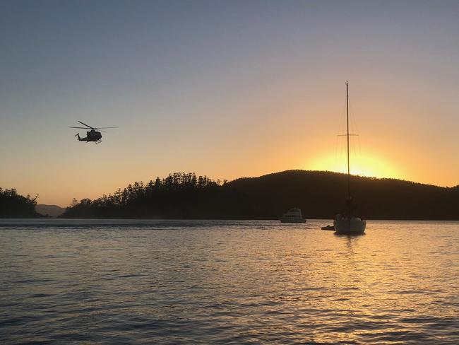 RACQ CQ Rescue Helicopter at the scene of the shark bite at Cid Harbour.