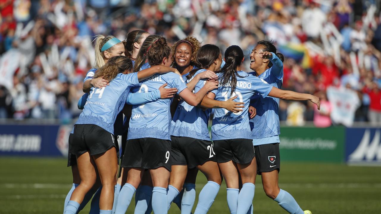 The Chicago Red Stars mob Sam Kerr after she scored the winner in their NWSL semi-final. (AP Photo/Kamil Krzaczynski)