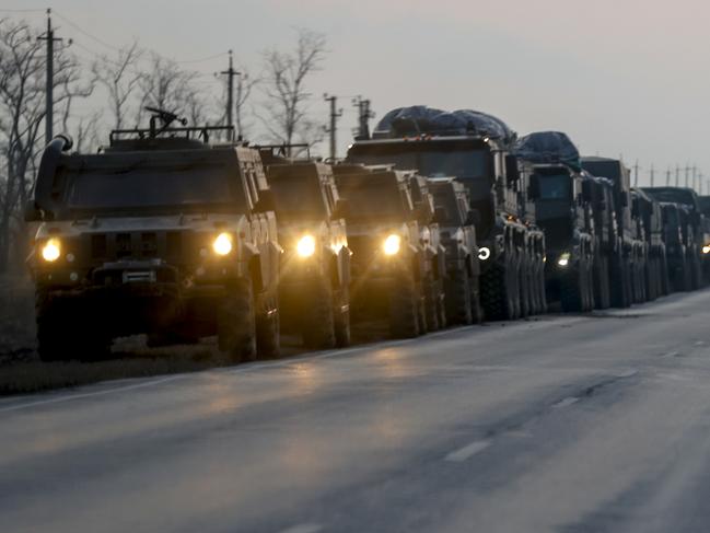 A convoy of Russian military vehicles is seen as the vehicles move towards border in Donbas region of eastern Ukraine.