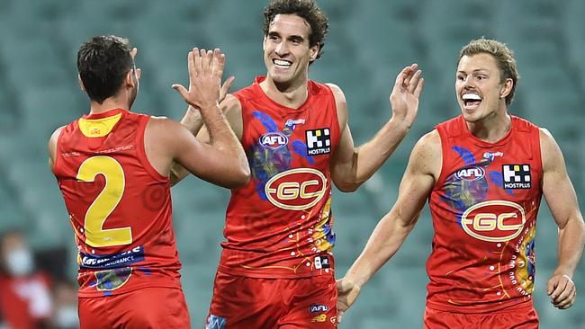 Ben King, centre, celebrates a goal for the Gold Coast Suns during his side’s win over Hawthorn in their round 11 AFL match at the Sydney Cricket Ground, Picture: Albert Perez/AFL Photos/via Getty Images