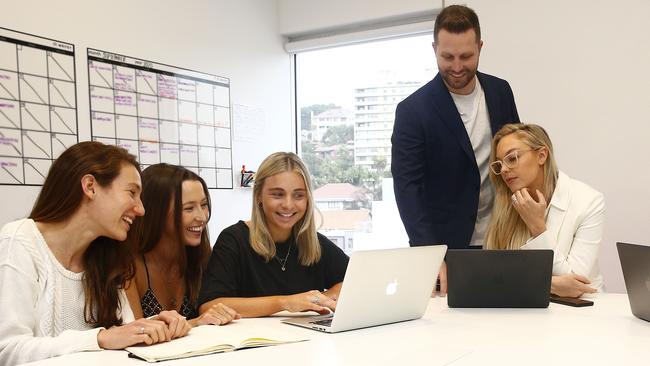 Kristy Fleming, Jodi Strasser, Ashleigh Pollock, Dean Steingold and Jessica Sepel meet in the board room at JS Health. Picture: John Appleyard