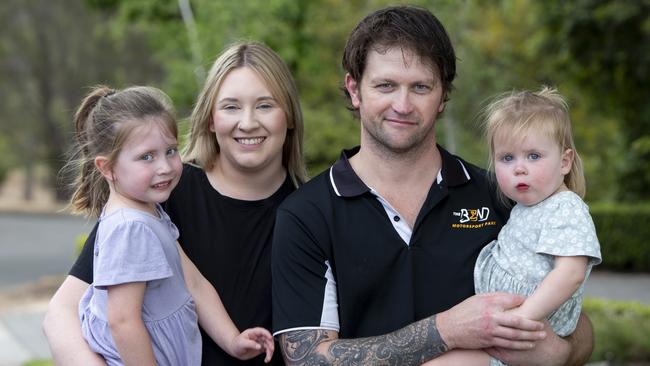 Daniel Goodwin at home with daughters Sophie 2, Olivia 4 and wife Danielle. Picture: Brett Hartwig