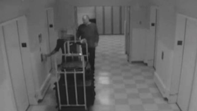 The video shows staff unwittingly helping Paddock bring luggage reportedly filled with guns and ammunition to his hotel room.