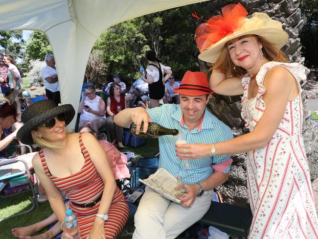 The champers flowed for Kim Billington, left, Aleksandar Nikolovski and Ellie Vrangalas. NCA NewsWire / David Crosling