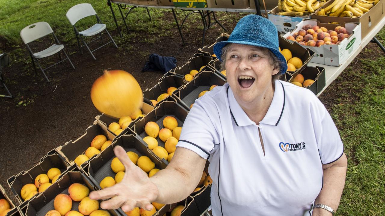 Tony's Community Kitchen volunteer Alison Hunter loves selling mangoes. Picture: Nev Madsen.