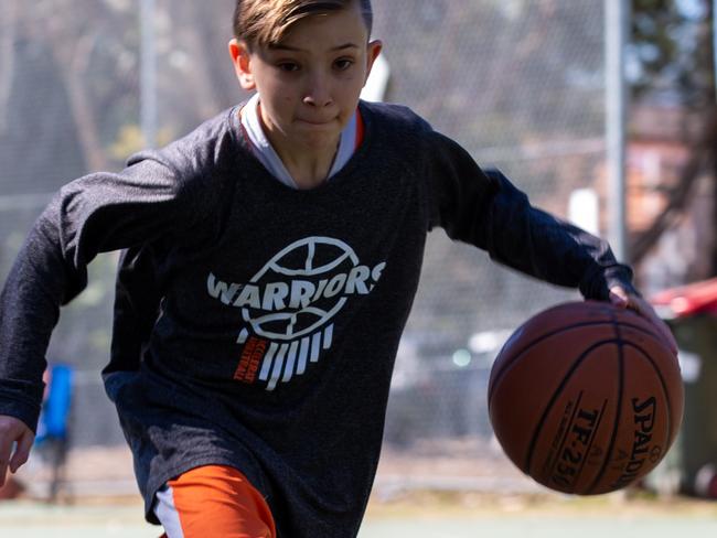 Young basketball player AJ Arcuri (11 years old) at Strathfield Park, Saturday 18th August 2018. (AAP Image/Jordan Shields)