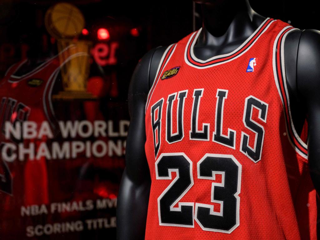 Michael Jordanâs game-worn 1998 NBA Finals âThe Last Danceâ jersey, from game 1, is displayed during Sothebyâs âInvictusâ sales, in New York City on September 6, 2022. - The iconic red Chicago Bulls jersey, with Jordan's number 23 on the back, is only the second worn by the star during his six championships to be sold at auction. (Photo by ANGELA WEISS / AFP)