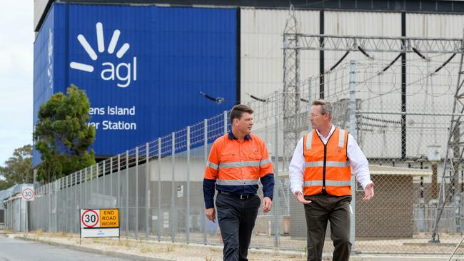 AGL managing director and CEO Brett Redman and Energy Minister Dan van Holst Pellekaan at AGL's Torrens Island Power Station, which will be the site of the state's new biggest battery. Picture AGL