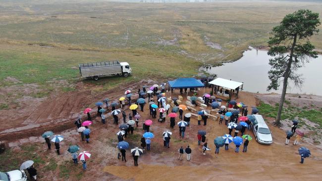 The funeral of Tim Miller on Peter's property during Covid.