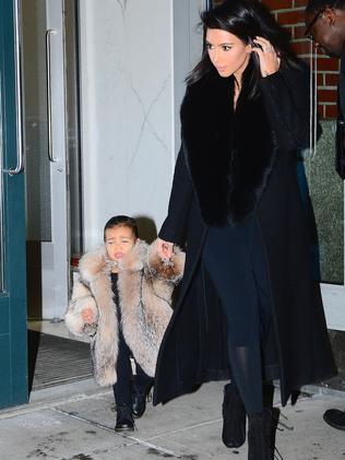 Kim Kardashian and Kanye West attacked for dressing North in a fur coat