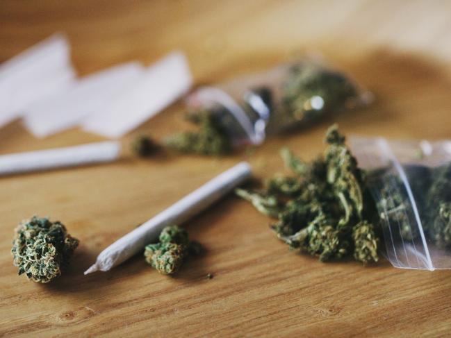 Shot of dried marijuana and a rolled joint. Cannabis clipseal bag generic image. Picture: iStock