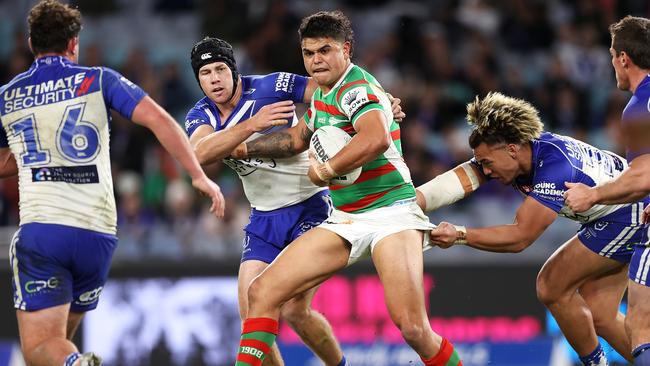 Latrell Mitchell and Matt Burton went head-to-head. (Photo by Mark Kolbe/Getty Images)