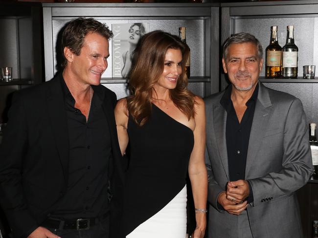 George Clooney and Rande Gerber (with Cindy Crawford) made a mint out of tequila. Picture: Zuma Press.