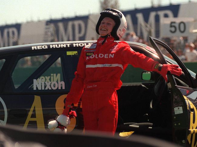 TV presenter Lavinia Nixon getting out of smashed celebrity race car in 1998.