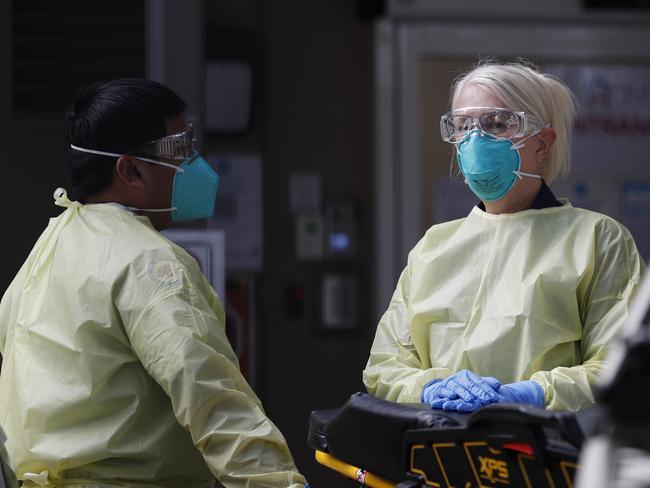 SYDNEY, AUSTRALIA - NewsWire Photos AUGUST 2, 2021: Ambulances prepare to remove residents of Hardi Aged Care in Summer Hill after a COVID-19 outbreak. Picture: NCA NewsWire / Nikki Short