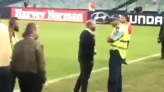 Celebrity chef George Calombaris escorted from Allianz Stadium following an altercation with a fan.