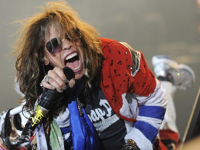 FILE - In this Aug. 14, 2010 photo, Steven Tyler performs with Aerosmith at Fenway Park in Boston. Jennifer Lopez and Steven Tyler will join Randy Jackson as 'American Idol' judges next season, after months of turnover and speculation about the future of TV's top-rated show. With pomp rivaling that of a U.S. Supreme Court appointment, Fox finally assembled the new pieces of the 'Idol' panel that will be returned to its original three-member format for season 10. .(AP Photo/Boston Herald, Christopher Evans) MANDATORY CREDIT; NO ONLINE USE; NO SALES; BOSTON OUT; QUINCY OUT; MAGS OUT