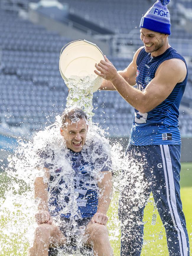 Joel Selwood got a head start on the Big Freeze with a little help from teammate Tom Hawkins. Picture: Tim Carrafa