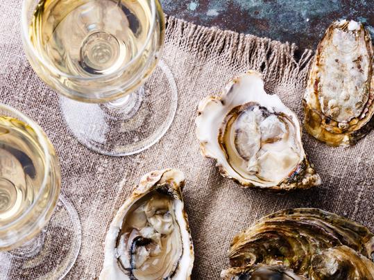 Before breaking out the oysters this summer, make sure you have the perfect wines to pair them with, courtesy of delicious. Drinks Delivered. Image: iStock.