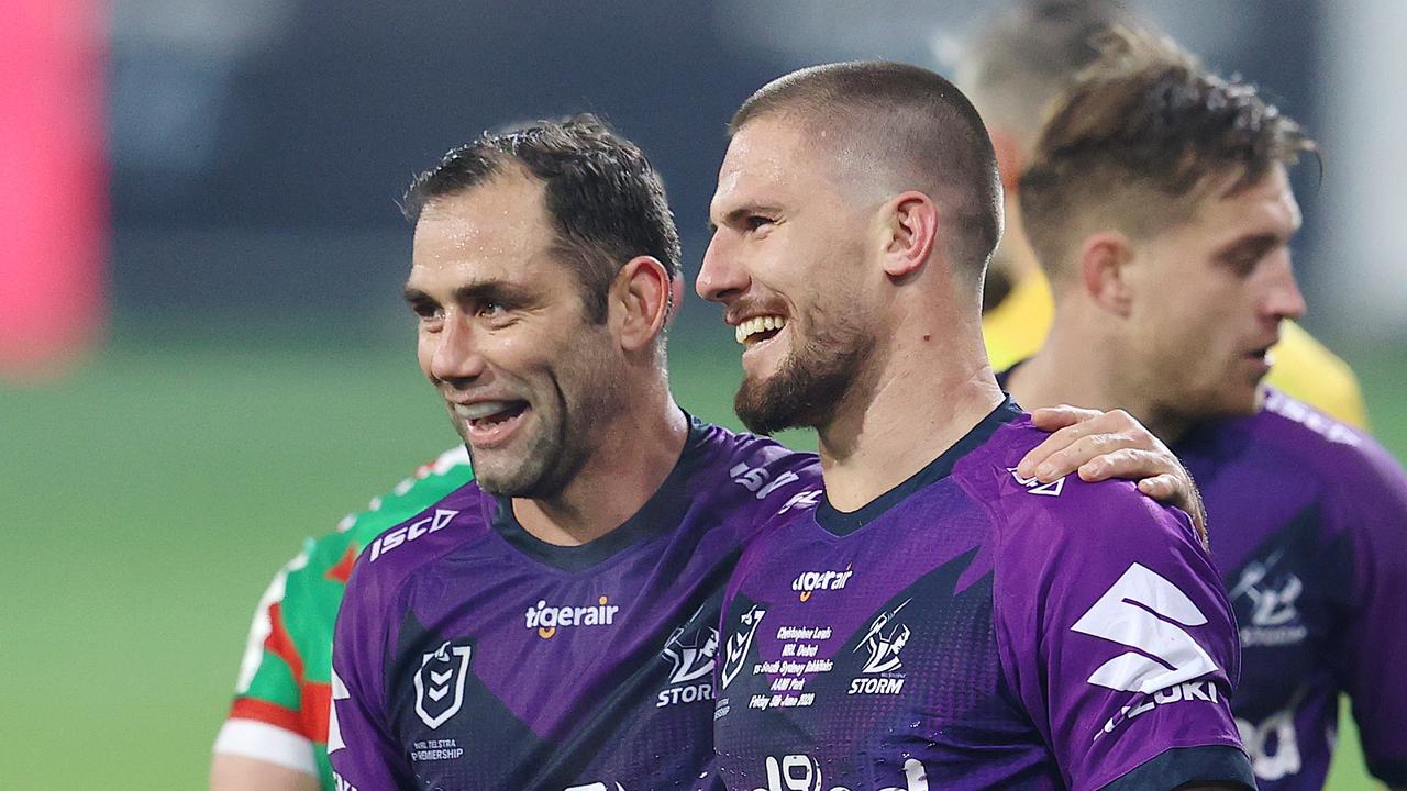 Melbourne’s Chris Lewis and Cameron Smith celebrate after a game. Picture: Michael Klein