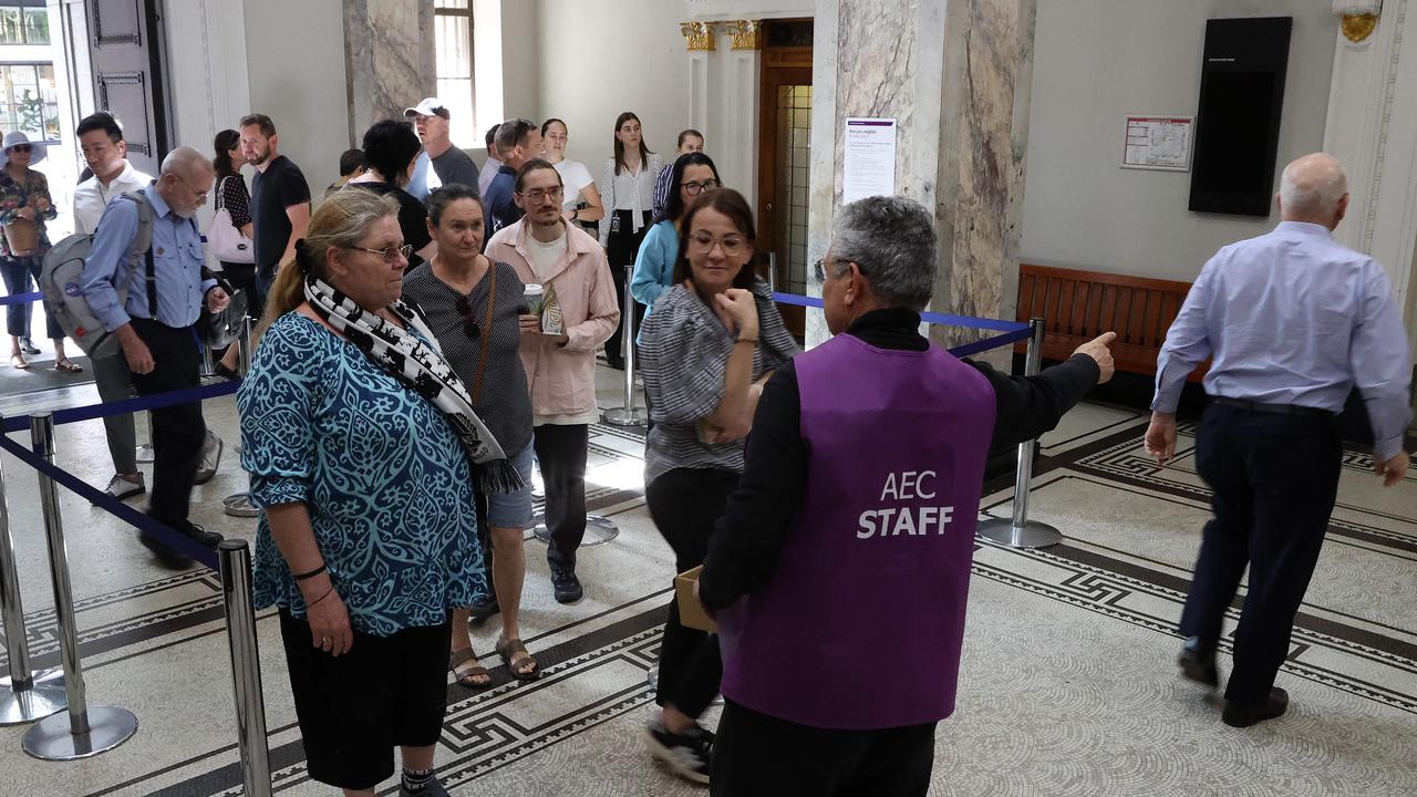 Lineup for early voting in the Voice referendum at Brisbane City Hall. Picture: Liam Kidston