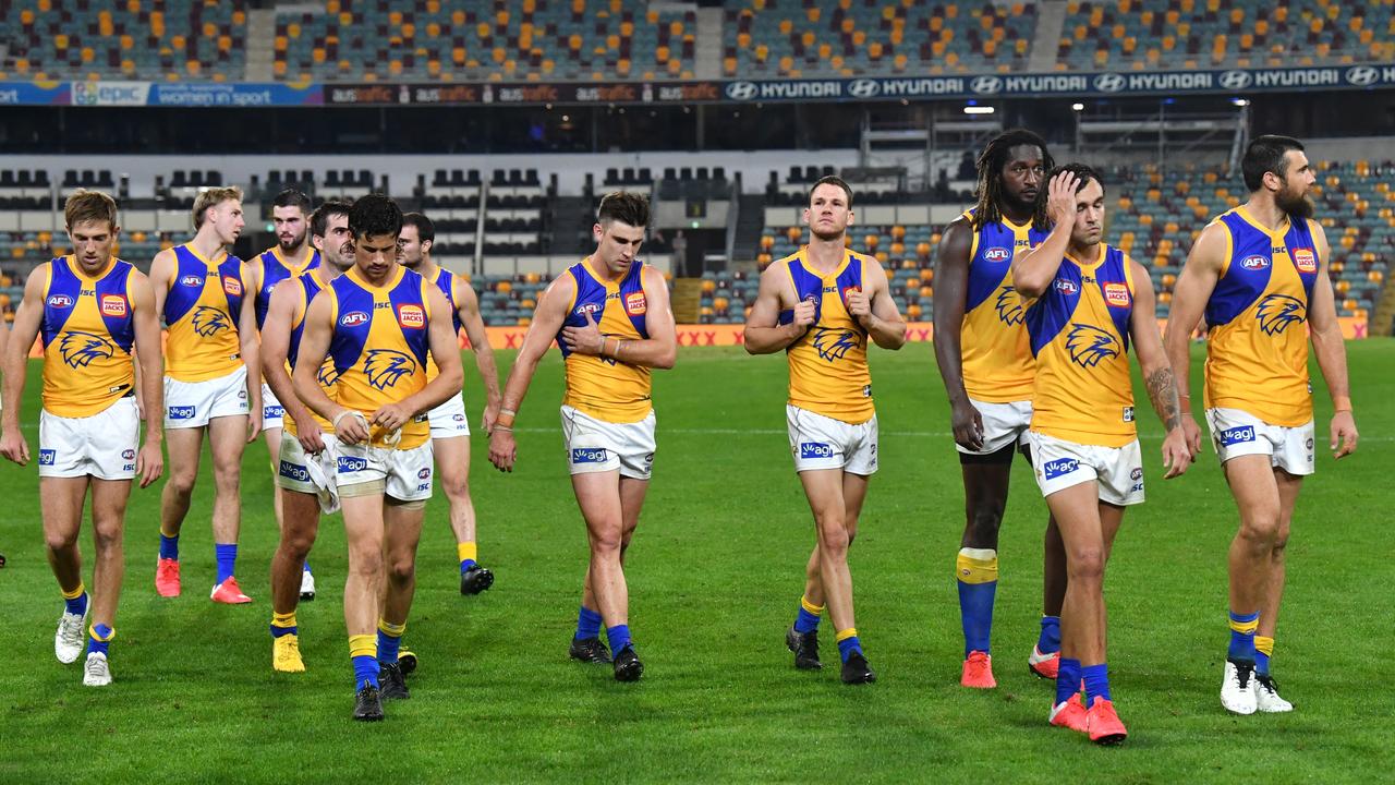 Eagles players after losing the Round 3 AFL match to the Brisbane Lions. Picture: Darren England