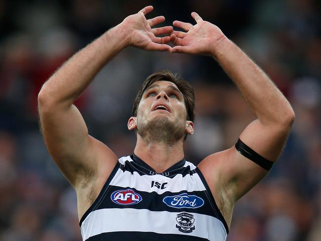 Hawkins gestures to the sky to pay tribute to his mother. Picture: Darrian Traynor/AFL Media