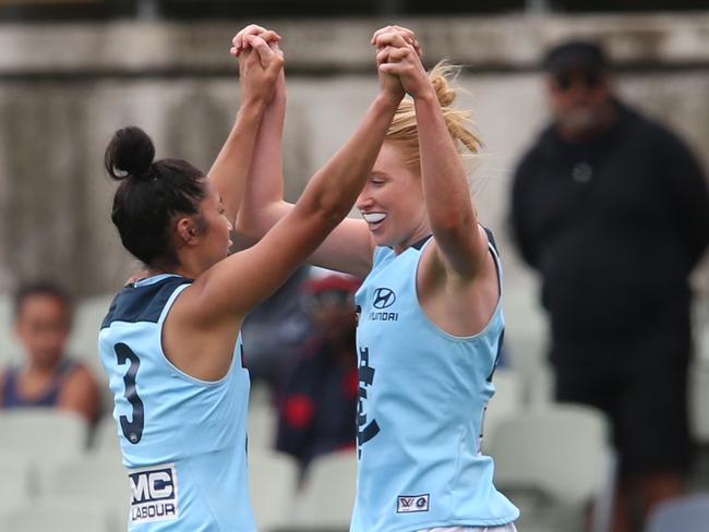 Kate Shierlaw (right) with teammate Darcy Vescio during Carlton’s practice match against Melbourne last week. Picture: David Crosling