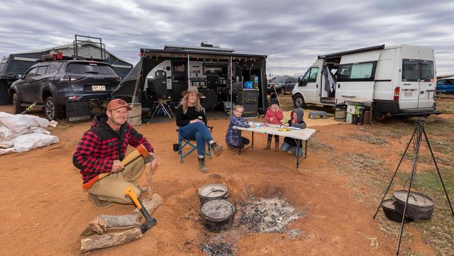 Joe and Zoe Toland with their children Lacey, 7, Freya, 2, and Harley, 8, ahead of Thursday’s first-night concert headlined by Midnight Oil. Picture: Matt Williams