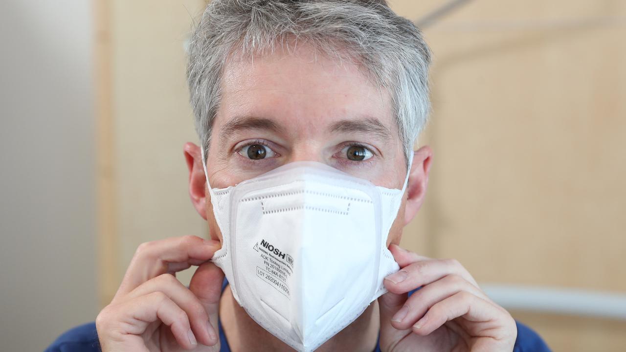 Recent Australian studies have revealed while surgical and fabric masks are at least 50 per cent effective at filtering out virus particles, N95 masks are 95 per cent effective. Picture: Peter Wallis