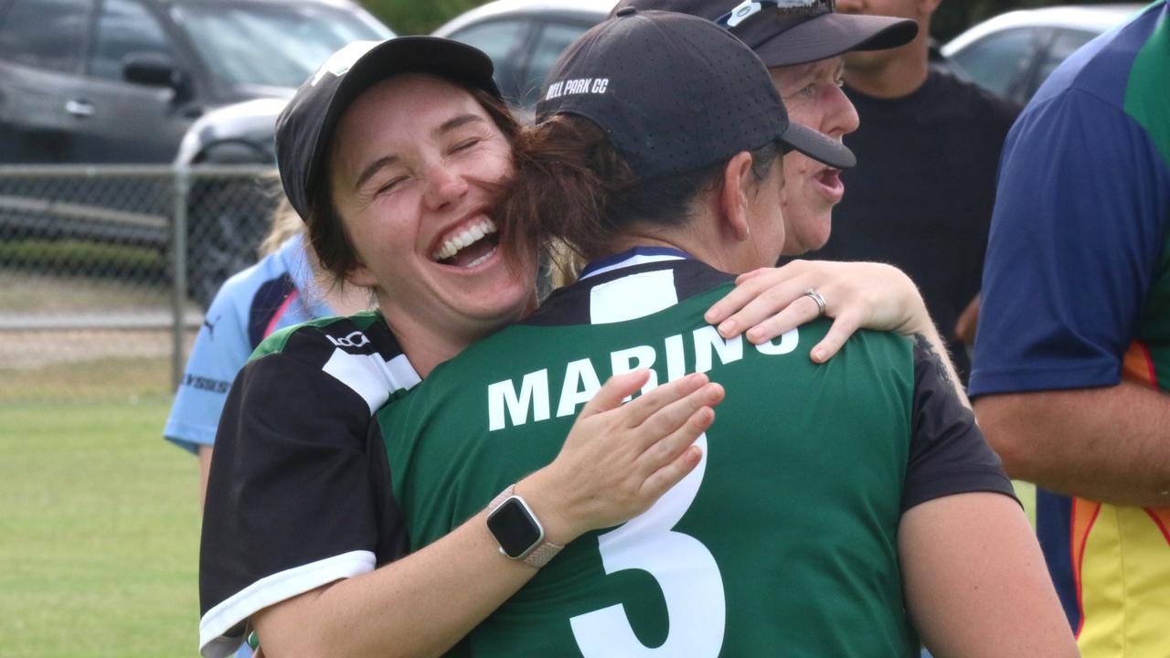 Injured Bell Park skipper Mollie Robbins (left) embraces teammate Lauren Marino after the Dragons' B-grade grand final win. Picture: Meg Saultry