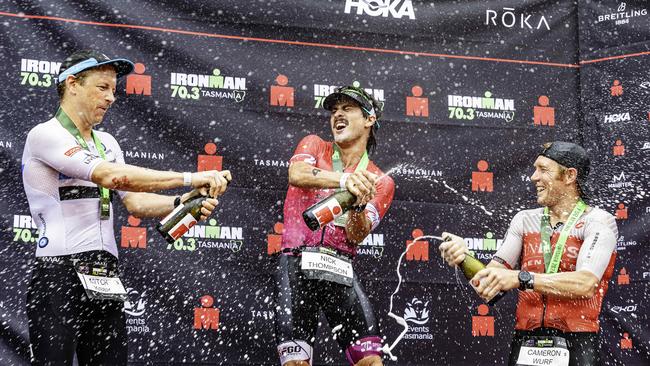 Winners on the podium at the Ironman 70.3 Tasmania in Hobart on Sunday 4th February 2024. L-R Mitch Kibby 2nd, Nick Thompson 1st, and Cam Wurf third. Picture: Linda Higginson