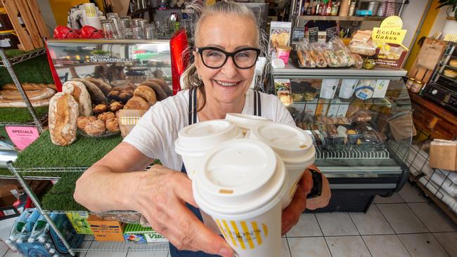 Chapel St precinct coffee shop owner Alison Baker says her takeaway coffee sales have surged by 38 per cent during the coronavirus outbreak, which has saved her business. Picture: Tony Gough