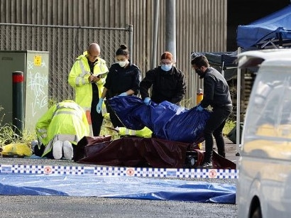 The 40-year-old man’s body was removed from the scene around 9:45am. Picture: Tim Hunter.