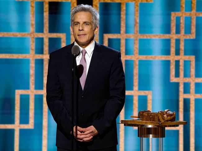 Ben Stiller with a loaf of banana bread shaped like a Golden Globe. Picture: AFP