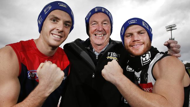 Neale Daniher with AFL players Jake Lever and Taylor Adams. Picture: David Caird