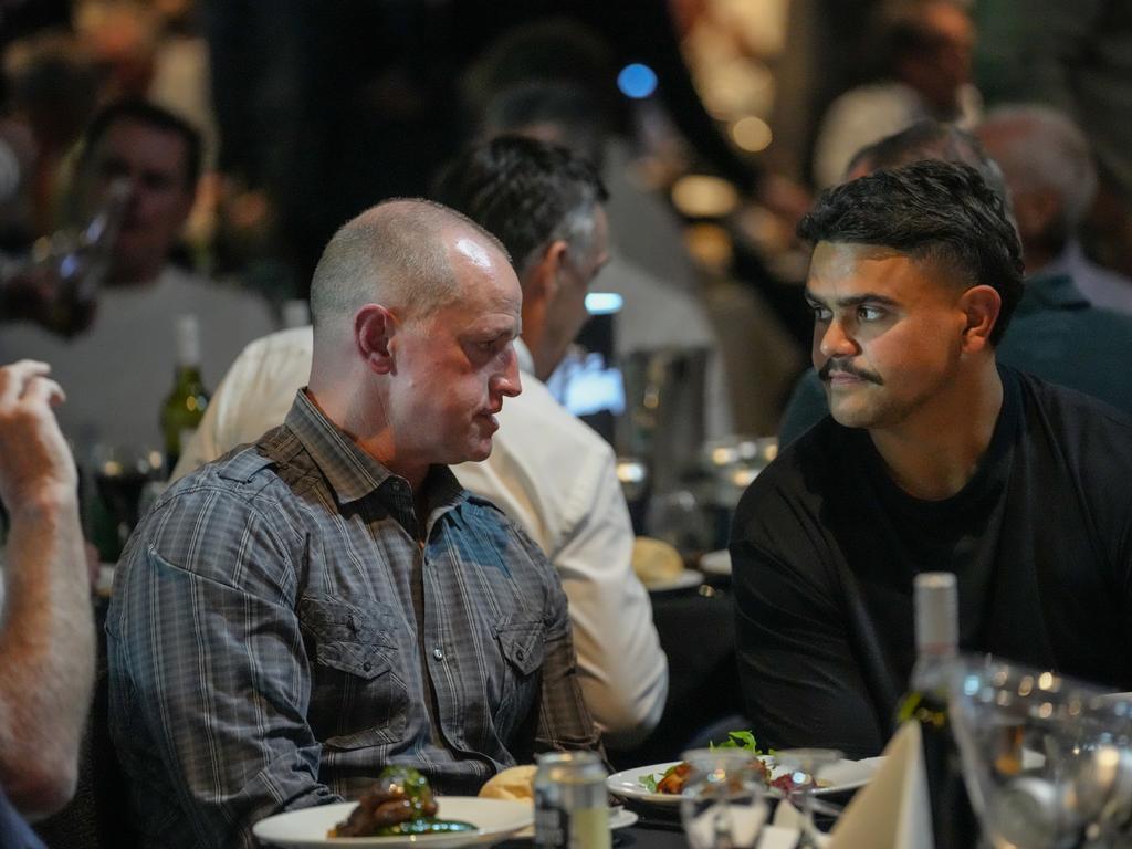 Michael Maguire and Latrell Mitchell in discussion at the 10-year reunion of the Rabbitohs' 2014 premiership win at Souths Juniors. Credit: Rabbitohs,