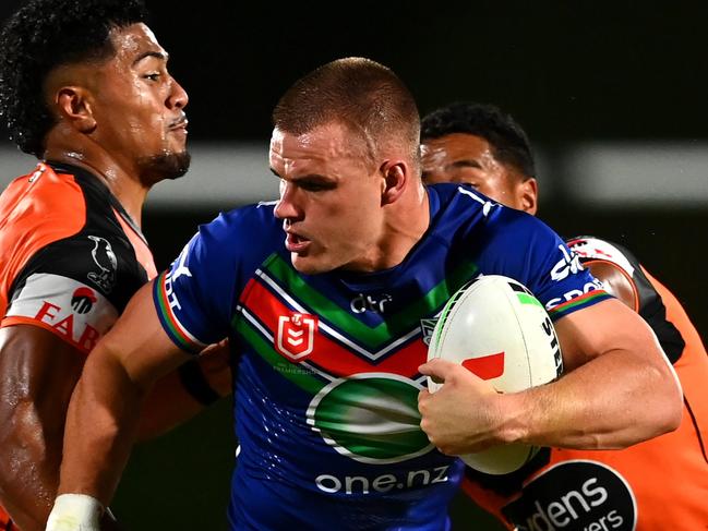 AUCKLAND, NEW ZEALAND - FEBRUARY 09: Jackson Ford of the Warriors is brought down during the NRL trial match between New Zealand Warriors and Wests Tigers at Mt Smart Stadium on February 09, 2023 in Auckland, New Zealand. (Photo by Hannah Peters/Getty Images)