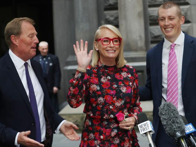 Sally Capp, flanked by husband, Andrew, and son, Nic, announces she is stepping down as Lord Mayor of Melbourne. Picture: David Crosling