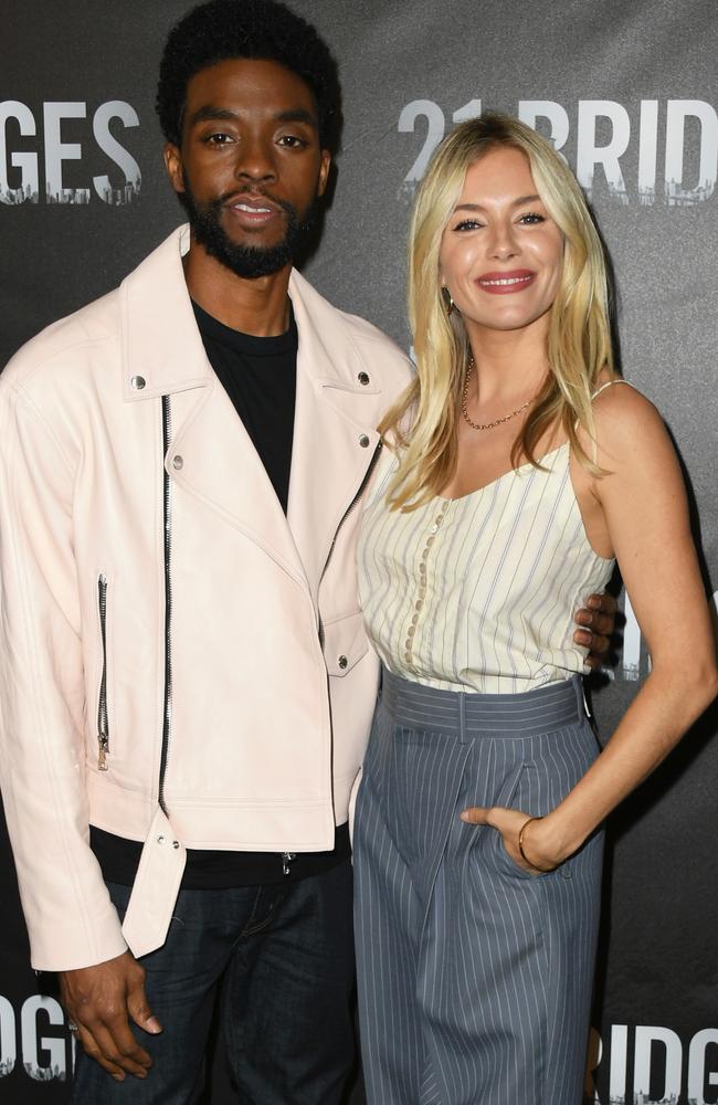 Chadwick Boseman and Sienna Miller starred in 21 Bridges together. Picture: Jon Kopaloff/Getty Images