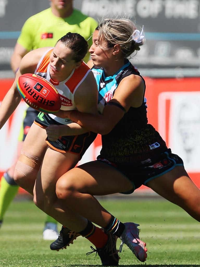 Amelie Borg tackles Giant Isabel Huntington. Picture: James Elsby/AFL Photos