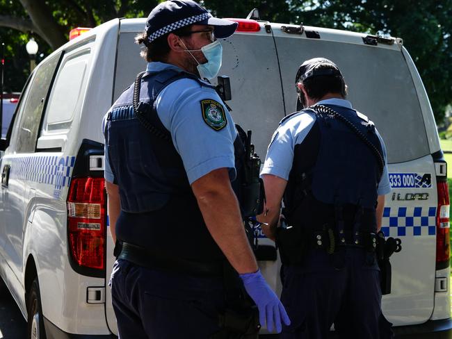 SYDNEY, AUSTRALIA - NewsWire Photos, AUGUST, 31, 2021: Police arrest members of the public during a protest at Govt House in Sydney. Picture: NCA NewsWire/ Gaye Gerard