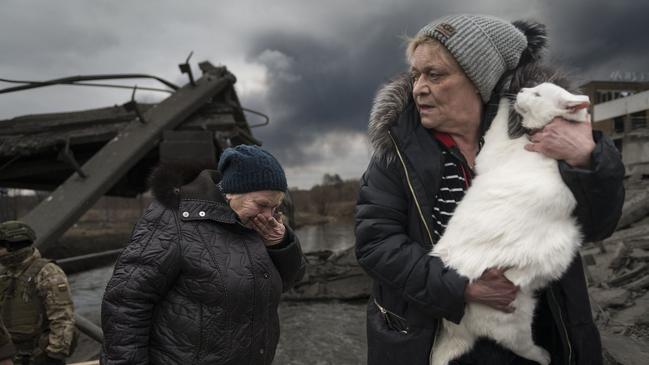 Ukrainians evacuate the city of Irpin, near Kyiv, in the early days of the Russia invasion, March 7, 2022. Picture: Christopher Occhicone/WSJ