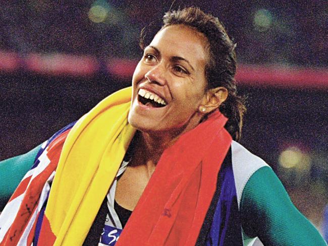 ***  FOR USE BY STELLAR MAGAZINE *** MUST NOT RUN BEFORE: AUGUST 30, 2020 *** STELLAR COVER STORY: Cathy Freeman *** Caption: CHP_Export_184781320_25 Sep 2000  Cathy Freeman of Australia celebrates gold in the Womens 400m Fina*** ©Nick Wilson /Allsport ***