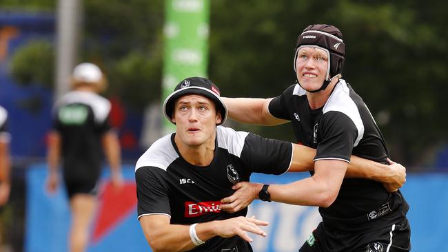 Collingwood Training at Olympic Park. Darcy Moore and Sam McLarty battle. Pic: Michael Klein