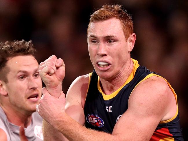 ADELAIDE, AUSTRALIA - MAY 5: Cameron O'Shea of the Blues tackles Tom Lynch of the Crows  during the 2018 AFL round seven match between the Adelaide Crows and the Carlton Blues at Adelaide Oval on May 5, 2018 in Adelaide, Australia. (Photo by James Elsby/AFL Media/Getty Images)